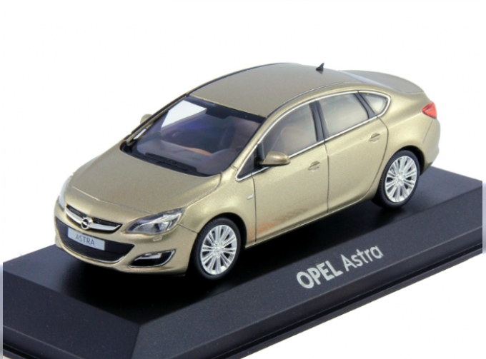 Opel Astra J 4d sedan 2012 золотистый мет