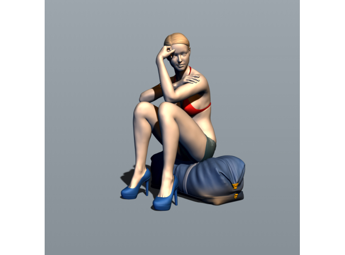 Фигурка Красотка сидит на сумке, окрашенная