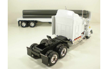 KENWORTH W900 трейлер платформа с трубами 1:43, белый