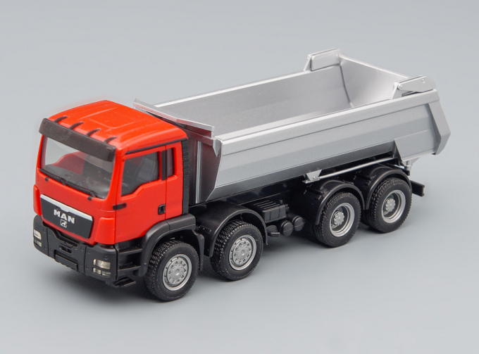 MAN TGS M 4-axle dump truck, red / black / aluminum