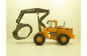 VOLVO L180C Лесозаготовительная машина, желтый