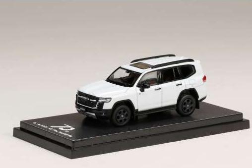 TOYOTA Land Cruiser (JA300W) ZX, precious white pearl (090) with black/red interior