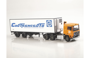 VOLVO F12 с полуприцепом Lamberet Совтрансавто, оранжевый / белый