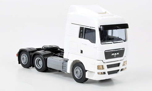 MAN TGX XLX 3х осный седельный тягач белый