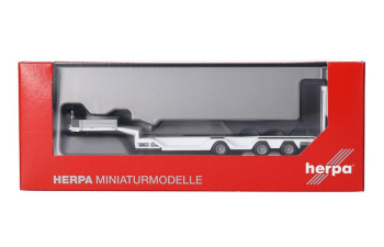 Низкорамный полуприцеп-тяжеловоз пятиосный Goldhofer, белый