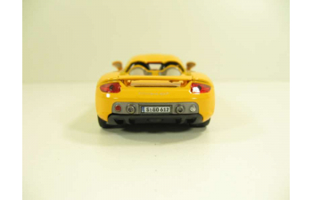 PORSCHE Carrera GT, 143PND 1:43, желтый