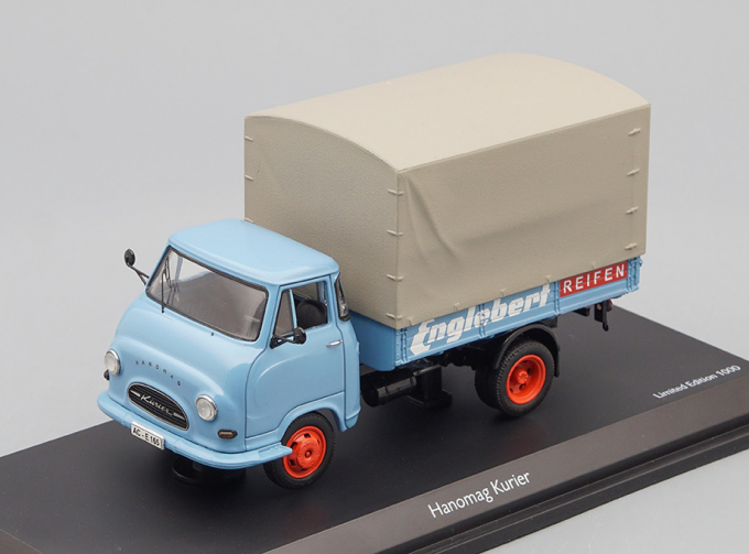 HANOMAG Kurier Pritsche/Plane Englebert Reifen, blue / grey