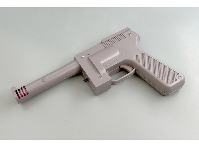 Игрушка пистолет "Straume", коричневый