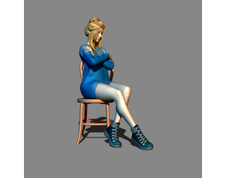 Фигура Девушка сидит на стуле, окрашенная