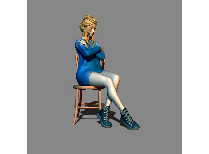 Фигура Девушка сидит на стуле, окрашенная