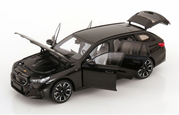 BMW i5 M60 Touring (2024), black metallic 