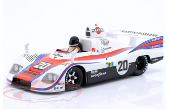 Фигурка сидящего гонщика в черном шлеме (1978)