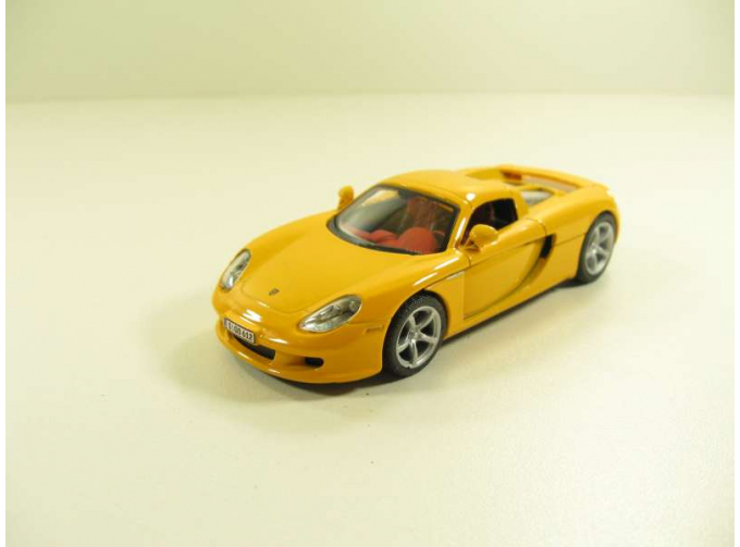 PORSCHE Carrera GT, 143PND 1:43, желтый