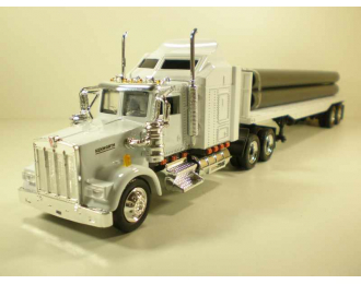 KENWORTH W900 трейлер платформа с трубами 1:43, белый