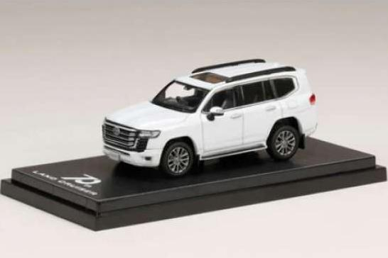 TOYOTA Land Cruiser (JA300W) ZX, precious white pearl with black interior