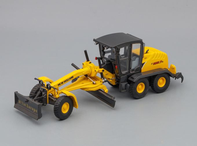 NEW HOLLAND F156.7A Grader, yellow / black