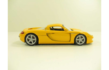 PORSCHE Carrera GT, 143PND 1:43, желтый