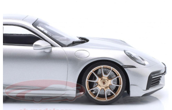 PORSCHE 911 (992) Turbo S Coupe (2024), silver / golden rims (Sport Design)
