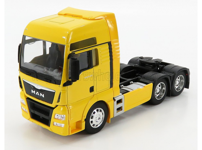 MAN TGX 26.440 (6x4), yellow