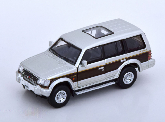 MITSUBISHI Pajero 2nd gen. LHD (1996), silver with red stripe