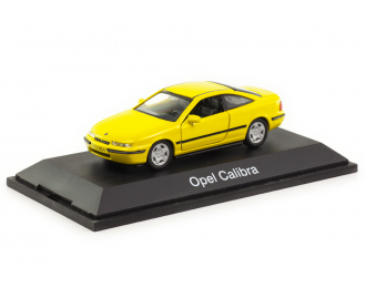 Opel Calibra желтый