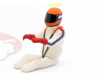 Фигурка сидящего гонщика в оранжевом шлеме (1976)